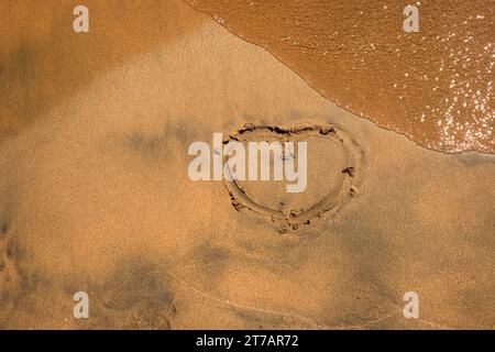 Beach. Shore of the Red Sea. Inscription on yellow sand. Egypt. Stock Photo