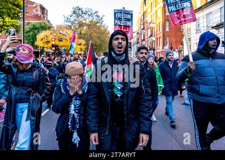 Angry Young British Muslims Call For A Ceasefire In Gaza and For Israel to Stop The Bombing of Gaza At The March for Palestine Event London, UK Stock Photo