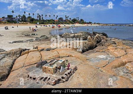 Tourists sunbathing on the Playa Verde beach, seaside barrio Punta Gorda of the city Montevideo, Uruguay, South America Stock Photo