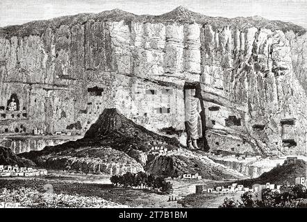 The Buddhas of Bamiyan, 6th-century monumental statues carved into the side of a cliff in the Bamyan valley of central Afghanistan. Old illustration from La Nature 1887 Stock Photo