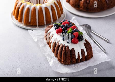 Variety of homemade bundt cakes and loaf cakes ready to eat overhead view Stock Photo