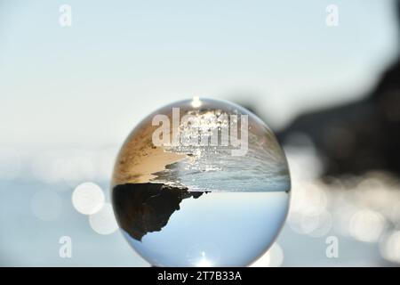 Spherical glass ball, Kilfarrasy beach Stock Photo