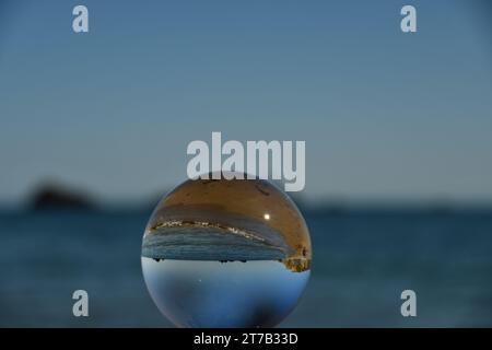 Spherical glass ball, Kilfarrasy beach Stock Photo