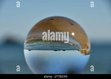 Spherical glass ball, Kilfarrasy beach Stock Photo