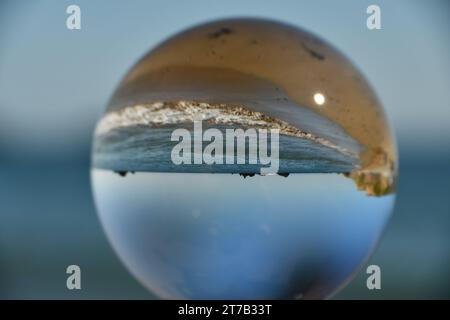 Spherical glass ball, Kilfarrasy beach Stock Photo