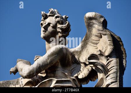 Italy, Rome, angel statue on Sant'Angelo bridge, angel with the superscription Stock Photo