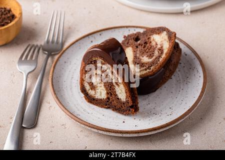 Marbled bundt cake sliced on a plate, chocolate and vanilla cake Stock Photo