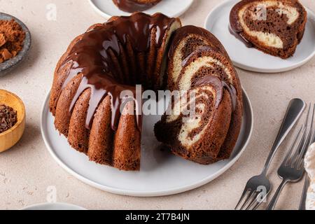 Marbled bundt cake sliced on a plate, chocolate and vanilla cake Stock Photo