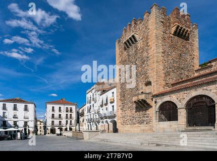 Europe, Spain, Extremadura, Cáceres, The Bujaco Tower and the Ermita de la Paz Chapel on the Plaza Mayor in the Old Town Stock Photo