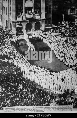 An image from the 1934 Eucharistic Congress in Melbourne, Australia. The image shows the Papal Legate, Cardinal MacRory give the final Benediction, after a procession of 67000 men and 5000 children carried The Host through the centre of Melbourne, witnessed it is said by half a million people. Stock Photo