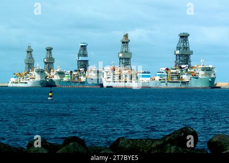 Drill ships await their next deployment at Las Palmas, Grand Canaria, L-R, Pacific Scirocco, Pacific Meltem, Valaris  DS-9, Ensco DS-7, Ensco DS-8. Stock Photo