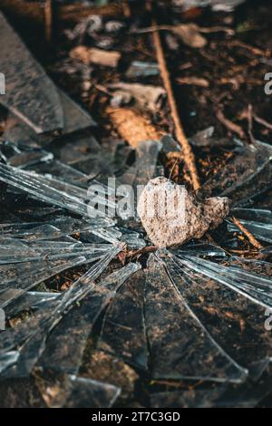 Broken glass, shards, stone, on ground, Mexico 2023 Stock Photo