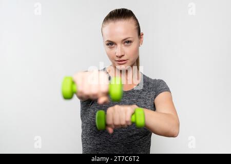 Front view woman with physiotherapy weights Stock Photo