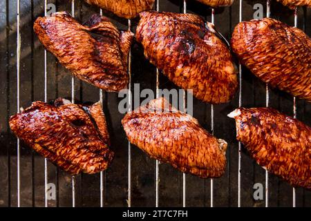 Overhead view delicious pieces chicken meat metal grill Stock Photo