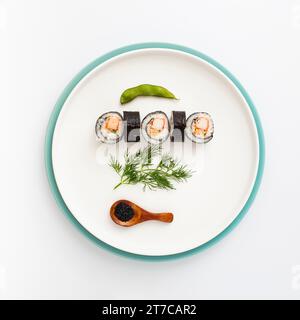 Flat lay plate with sushi Stock Photo