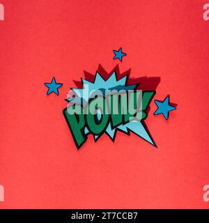 Stylish retro comic speech bubble with pow text with star elements red background Stock Photo