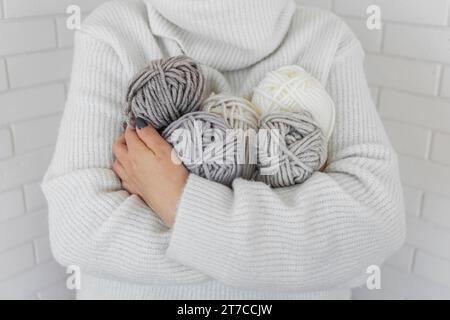 Woman holding knitting wool close up 3 Stock Photo