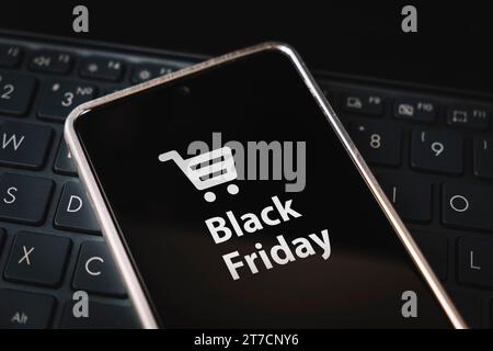 black friday sale. special offer discount text on mobile phone screen message. Get promotional code for discounted purchases during the sale. Buying t Stock Photo