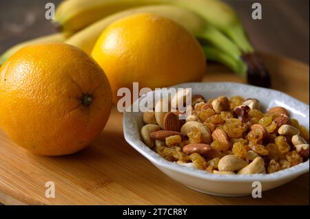 Closeup of various fruits on wooden background Stock Photo