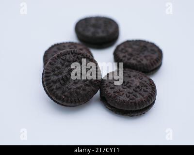 mini cookies with cream filling isolated on white background Stock Photo