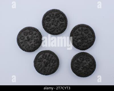 top view of mini cookies with cream filling isolated on white background Stock Photo