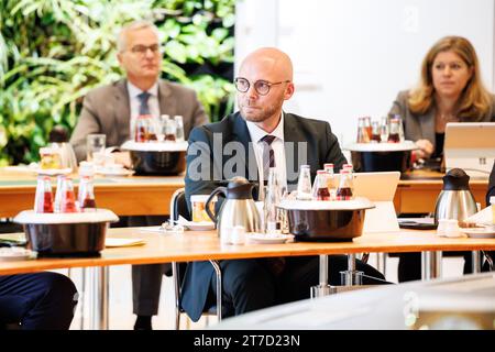 Munich, Germany. 14th Nov, 2023. Fabian Mehring (Free Voters), Digital Minister of Bavaria, sits in his seat at the start of a cabinet meeting at the Bavarian State Chancellery in Munich. Credit: Matthias Balk/dpa/Alamy Live News Stock Photo