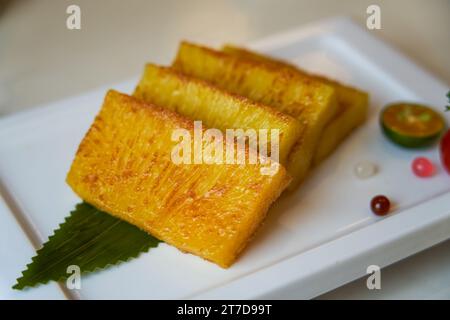 A plate of delicious pan-fried golden cake Stock Photo