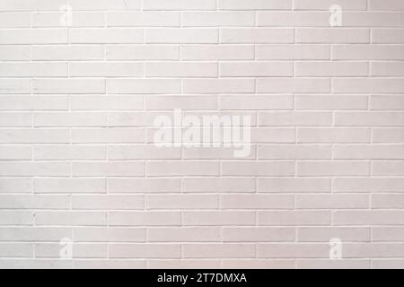 Full frame close up on a brick wall painted in white. Stock Photo