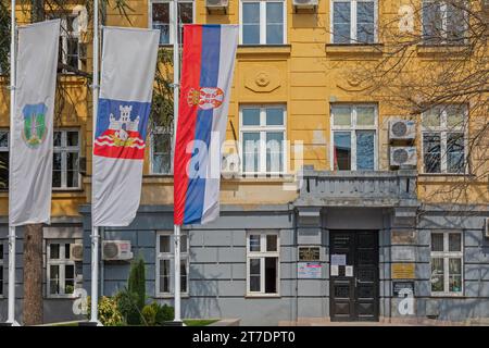 Sopot, Serbia - April 13, 2020: Official Flags in Front of Regional Government Office Building Municipality of Town Sopot. Stock Photo