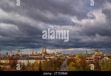 Munich, Germany. 15th Nov, 2023. Dark clouds drift over the skyline of the Bavarian capital. Credit: Peter Kneffel/dpa/Alamy Live News Stock Photo