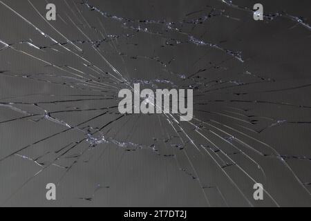 damaged LCD screen with cracks, full-frame background Stock Photo
