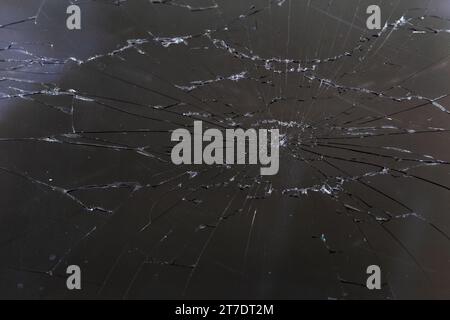 damaged LCD screen with cracks, full-frame background Stock Photo