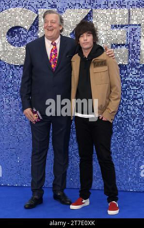 Stephen Fry and Elliott Spencer attend the 'Rocketman' UK premiere at Odeon Luxe Leicester Square in London. (Photo by Fred Duval / SOPA Images/Sipa USA) Stock Photo