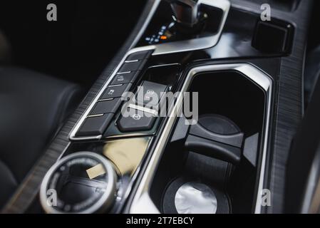 Detail of modern car interior, gear stick, automatic transmission in expensive car. High quality photo Stock Photo