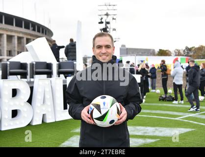 Berlin, Germany. 15th Nov, 2023. German former national soccer player Philipp Lahm, shows an official match ball of UEFA EURO 2024 during the unveiling event of the official match ball of UEFA EURO 2024 in Berlin, Germany, Nov. 15, 2023. Credit: Ren Pengfei/Xinhua/Alamy Live News Stock Photo