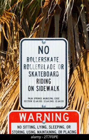 street sign in los angeles - warning NO ROLLERSKATE, ROLLERBLADE OR SKATEBOARD RIDING ON SIDEWALK Stock Photo