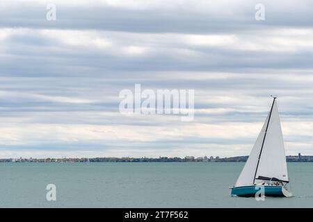 Sailing in cloudy weather in autumn on Lake Balaton Stock Photo