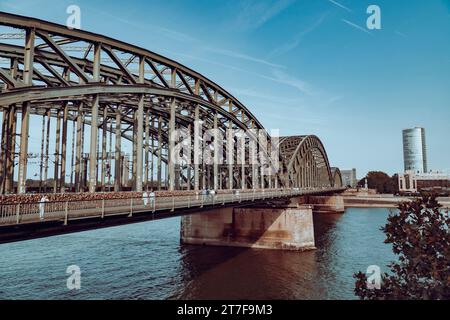 The Hohenzollern Bridge is a bridge crossing the river Rhine in the German city of Cologne. It is the most heavily used railway bridge in Germany Stock Photo
