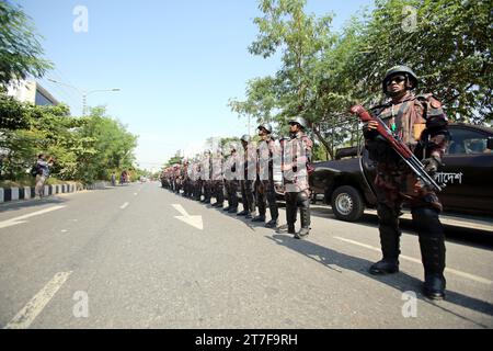 Border Guard Bangladesh (BGB) members stand guard in front of the ...