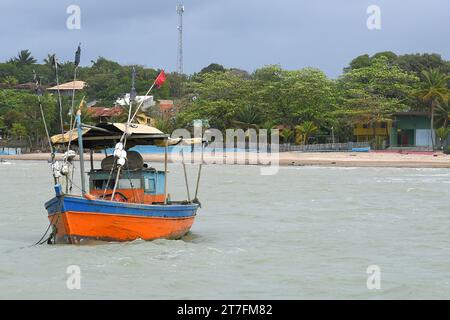 Brazil, Bahia September 7, 2023: fishing boats anchored near the beach ocean Stock Photo