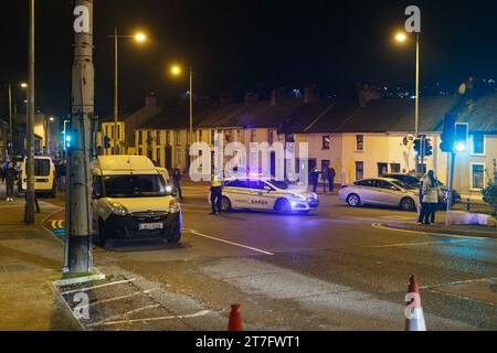 Cork, Ireland, 15th November 2023.  Gardai Force Car Linked to Family Fued Off Road, Blackpool, Cork, Ireland.  PLEASE DO NOT ADD MY NAME TO THE CREDITS FOR THESE PHOTOS IF USED.   A tense pursuit unfolded tonight as armed response units and undercover gardaí engaged in a high-speed chase with a vehicle believed to be linked to the ongoing feud between the McCarthy and Stokes families. The pursuit culminated at the junction of Dublin Hill and Watercourse Road, Blackpool around 8pm, as the suspect vehicle was forced off the road resulting in damage to a number of vehicles but gardai and local r Stock Photo