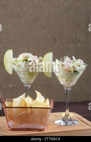 Ceviche dish of Peruvian and South American cuisine raw fish or shrimp marinated in lemon or lime juice or other citrus Stock Photo
