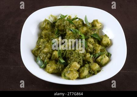 tasty italian pasta basil pesto gnocchi with herbs Stock Photo