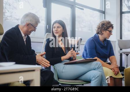 Multicultural Business Team Brainstorming for Better Efficiency and Results in Modern Corporate Office Stock Photo