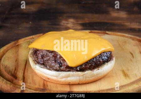 sandwich with beef burger on brioche bread salad egg and bacon street food fast food image Stock Photo