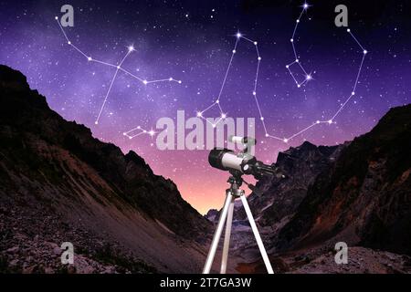 Different constellations in starry sky over mountains at night. Stargazing with telescope Stock Photo