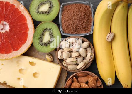 Many different products on table, flat lay. Natural sources of serotonin Stock Photo