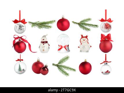 Collection of Christmas stuff isolated on white. Baubles, fir tree branches and snow globe Stock Photo