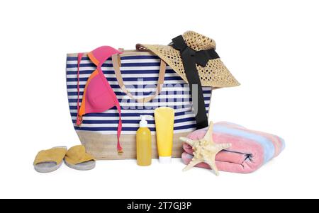 Stylish bag, starfish and other beach accessories isolated on white Stock Photo