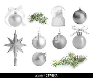 Collection of Christmas stuff isolated on white. Baubles, fir tree branches and snow globe Stock Photo